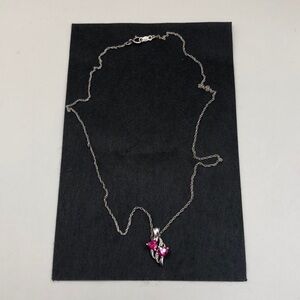 Vintage sterling silver heart embrace romantic love gemstone pendant necklace.